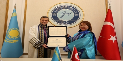 Üniversitemiz Tarafından Güney Kazakistan Devlet Pedagoji Üniversitesi Rektörü Prof. Dr. Gulzhan Sugirbayeva’ya Fahri Doktora Unvanı Verildi
