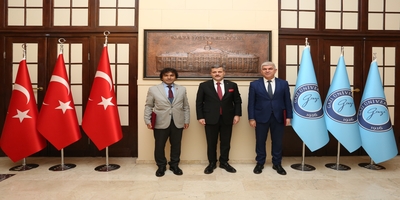 Millet Kütüphanesi Başkanı Ayhan Tuğlu, Rektörümüz Prof. Dr. Musa Yıldız’ı Ziyaret Etti