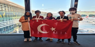 Üniversitemiz Öğretim üyesi Prof. Dr. Leyla Açık’ın Başkanlığındaki TÜBİTAK Biyoloji Olimpiyat Milli Takımının Büyük Başarısı