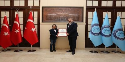 Türkiye’nin En Genç Yazarı Ali Kürşat Uzun, Rektörümüz Prof. Dr. Musa Yıldız’ı Ziyaret Etti