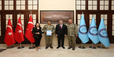 Prof. Dr. Elif Orhan, Dr. Can Candan ve Dr. Mehmet Tiken, Rektörümüz Prof. Dr. Musa Yıldız’ı Ziyaret Etti