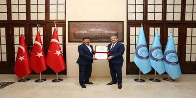 Türksoy Eski Genel Sekreteri Düsen Kaseinov ve Ankara Hacı Bayram Veli Üniversitesi İktisadi ve İdari Bilimler Fakültesi Dekanı Prof. Dr. Fırat Purtaş, Rektörümüz Prof. Dr. Musa Yıldız’ı Ziyaret Etti